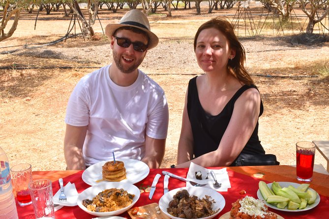 Cretan Farm Tour with Cheese-Making, Olive Oil Tasting & Picnic - Walking among olive trees and greenhouses