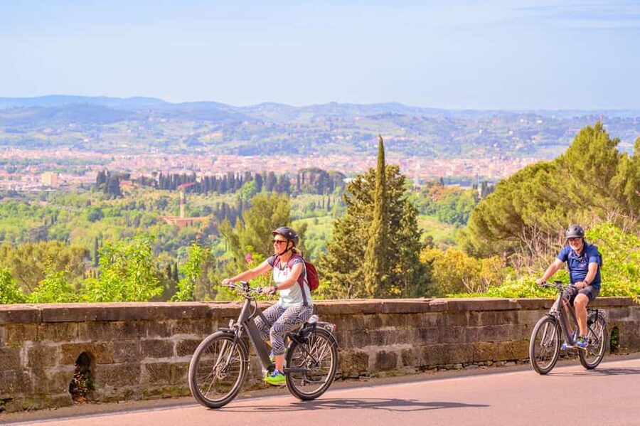 Fiesole E-Bike Tour with Olive Oil Tasting or Pool & Chill - The climb to Fiesole and the view over Florence