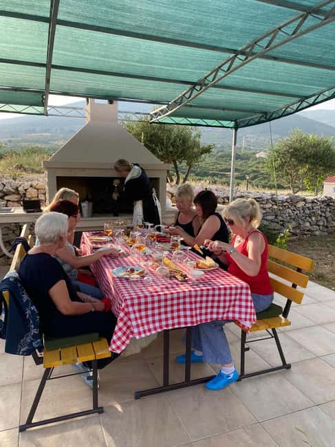 Kastela: Wine & Olive Tasting Tour w/Delicacies & Live Music - Accordion songs and traditional dress