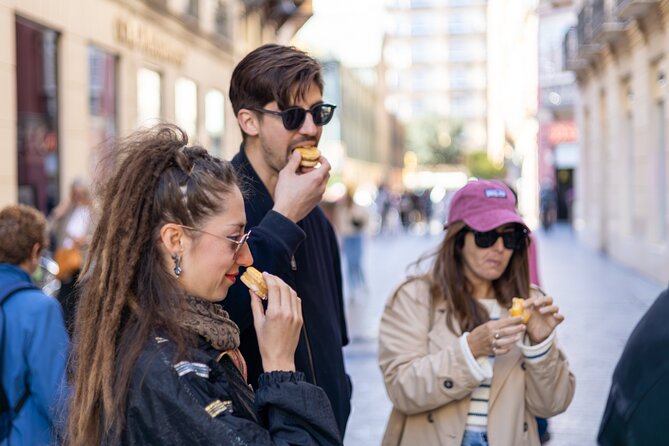 Malaga Food Tour with 12+ Tastings: Tapas, Olive Oil, Ham & More - La Manquita and the cathedral walk
