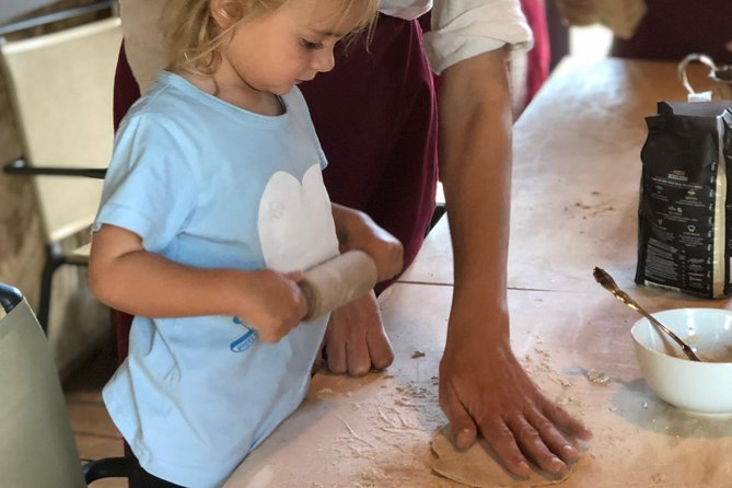 Organic cooking class with a sommelier in an Olive and wine farm - Rolling pasta by hand with Alina
