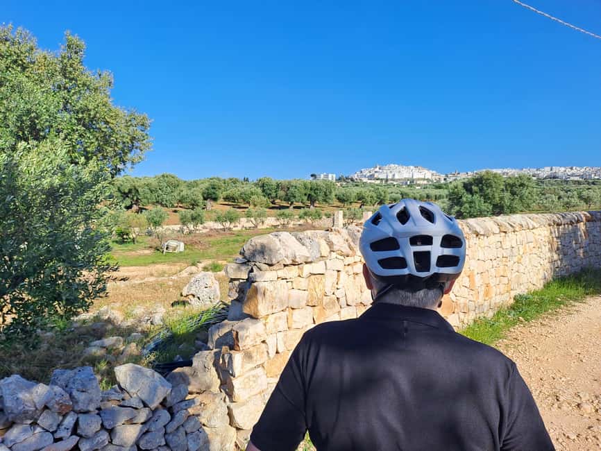 Ostuni: Guided e-bike tour to rock village & olive trees - From Ostuni’s parking lot to the olive plain